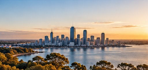 An Australian city overlooking the water at sunset